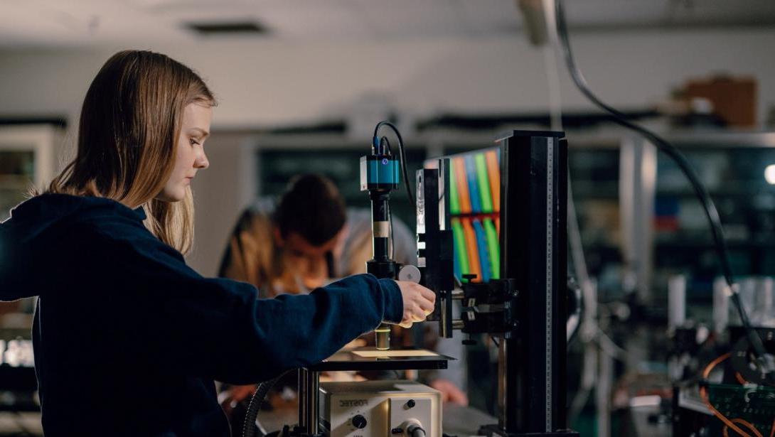 A student works in the Optics Lab