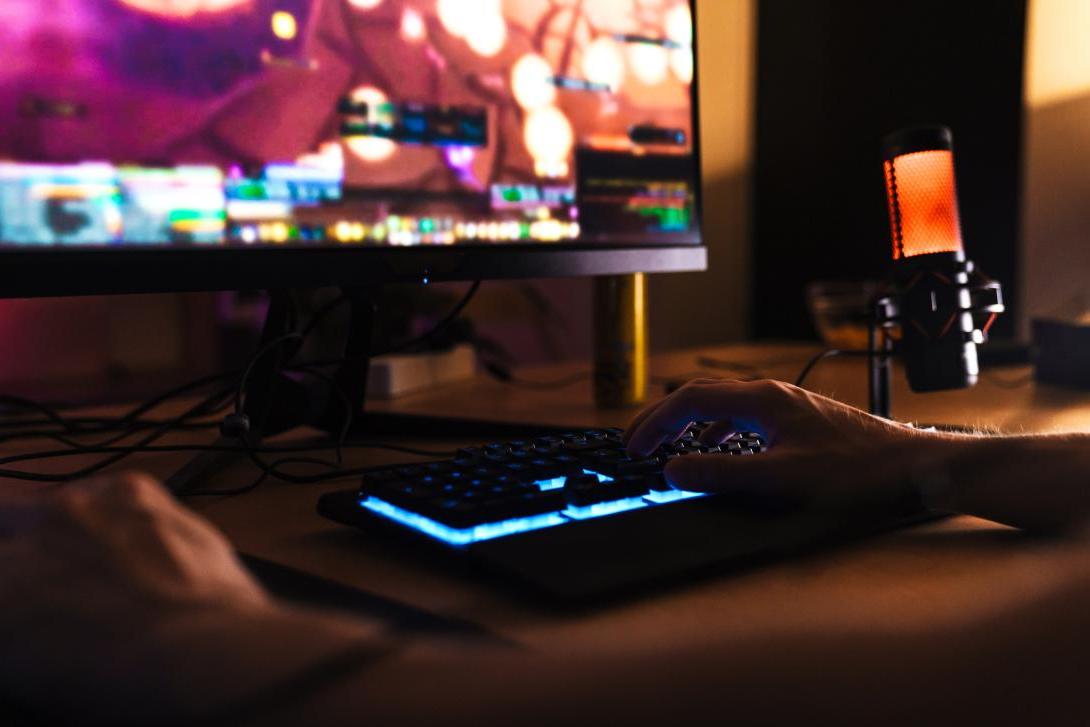 student playing game on computer